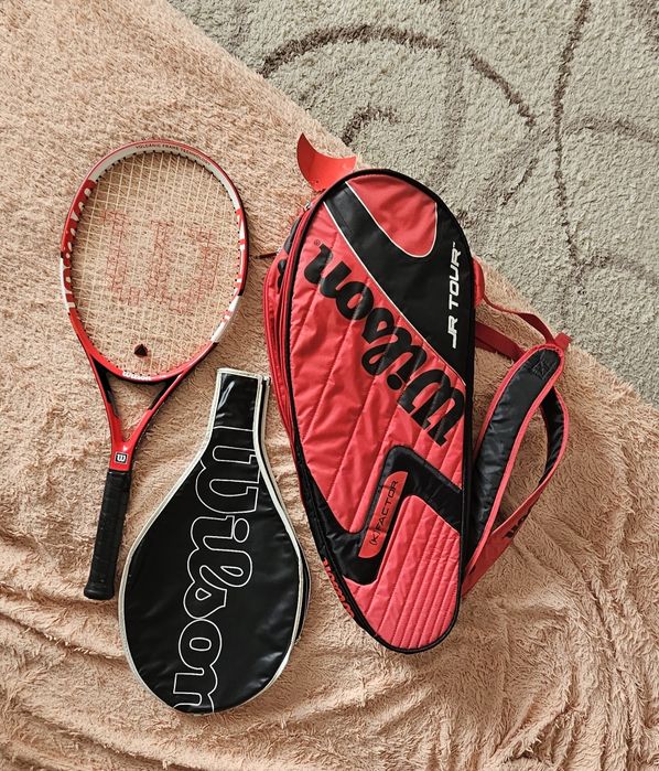 Теннисная ракетка