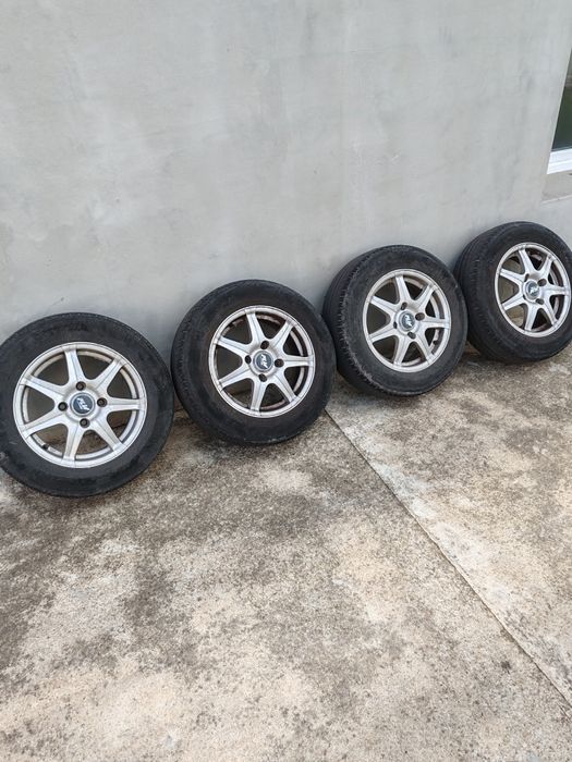 Джанти с гуми 4х114.3 14