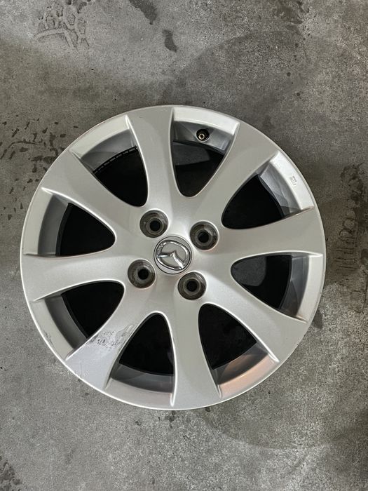 Set 4 jante aliaj 15  4x100 Originale Mazada Demio