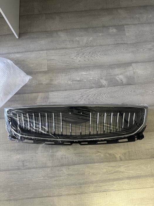 Решетка Geely Emgrand