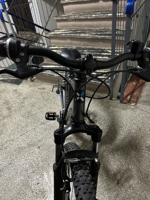 Bicicletă Rockrider ST 100 – ca nouă, puțin folosită + cauciucuri Carpatian upgrade