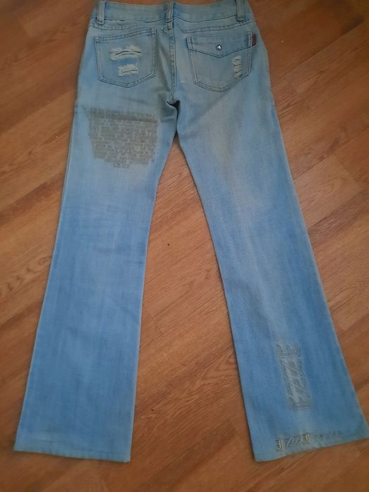 Джинсы женские рваные