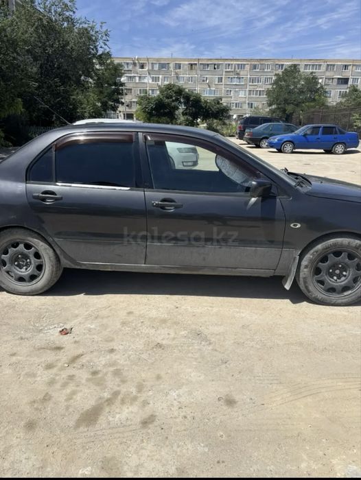 Машина Mitsubishi Lancer