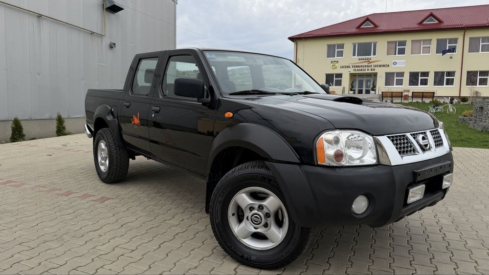 Nissan Navara D22 4x4 2004 2.5d 133 cp adus recent Italia impecabil fara rugina