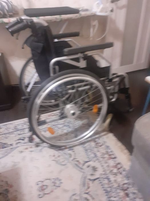 Инвалидная коляска