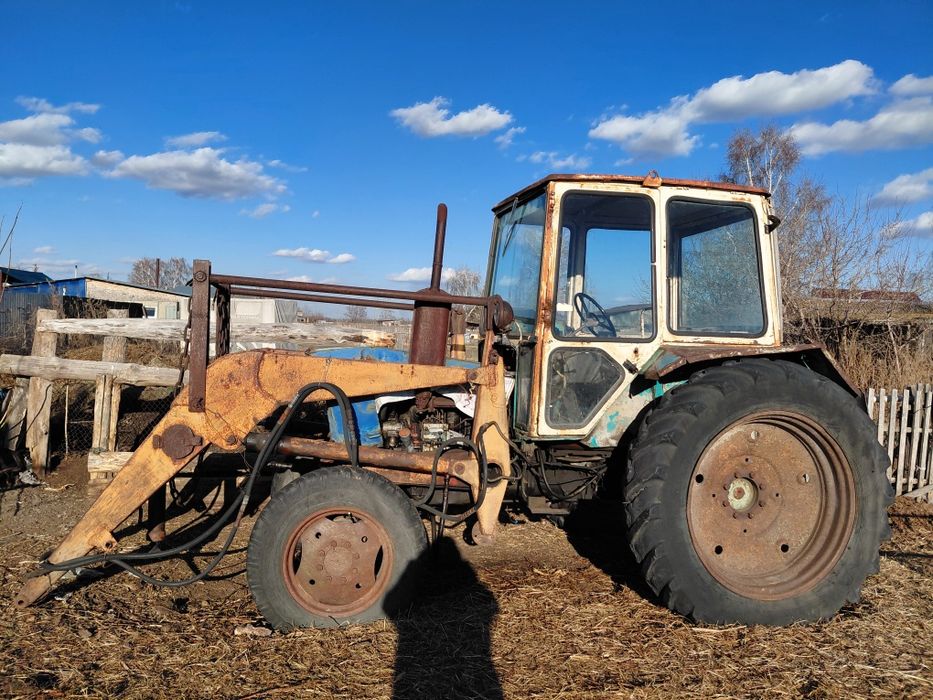 Продам трактор, косилку, две телеги, ковш