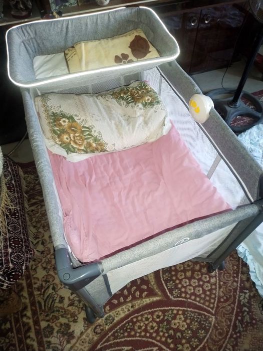 Детская кроватка-манеж