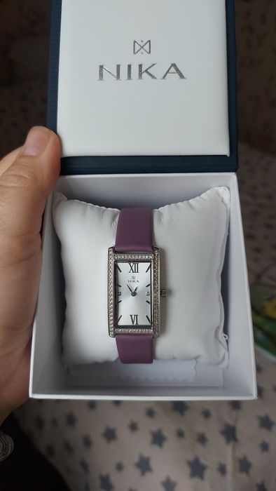 Серебряные часы Ника