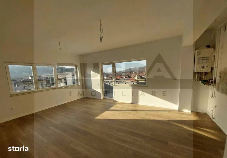 Apartament finisat cu 3 camere, 75 mp,  parare, zona Baciu Regal