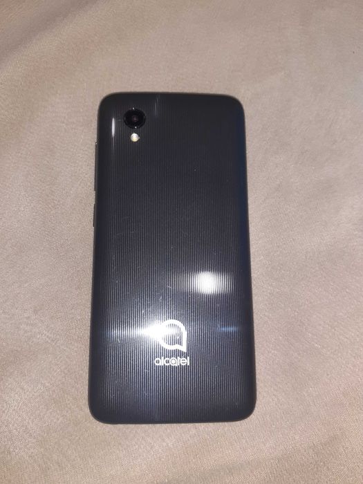 Смартфон  АЛКАТЕЛ  1