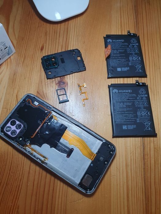 Телефони за части или за ремонт