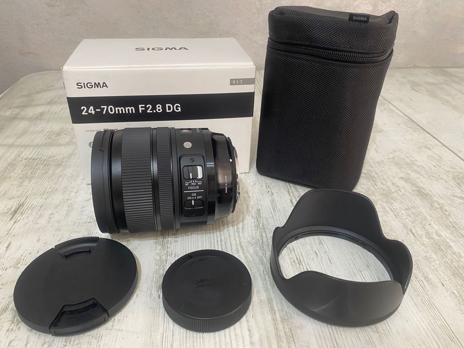 Vând obiectiv Sigma 24–70mm f/2.8 DG Art, montura EF, în garanție