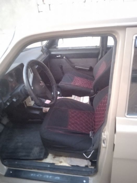 Автомобиль газ 2411