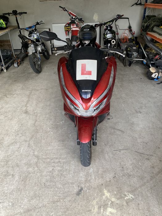 Scuter 125 motor conditie super o dau la vanzare ca nu o mai folosesc