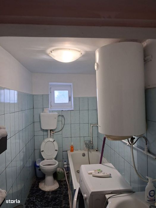 Casă cu 3 camere, teren 710 mp, utilități