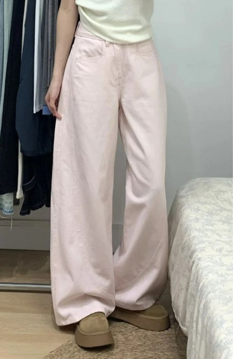 Нежно розовые джинсы