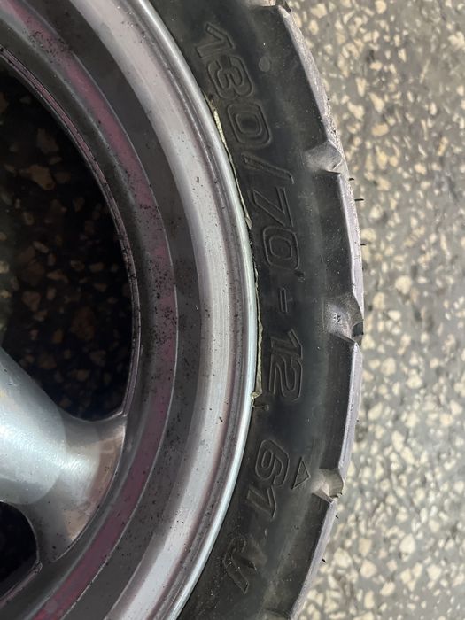 Janta  scuter spate cu cauciuc   130/70-12 61j