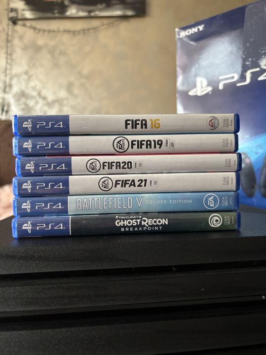 PS4 Pro 1TB + controller + 6 jocuri + box