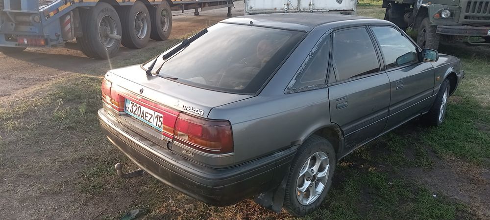 Мазда 626 2.0L 450000тг.