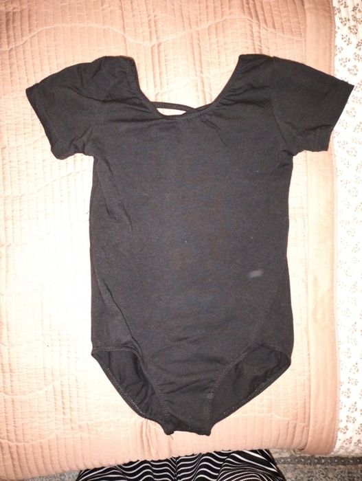 Продам  гимнастический   купальник  для  танцев для девочки.  Юбочка