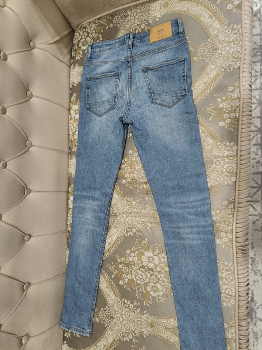 Джинсы новые colins