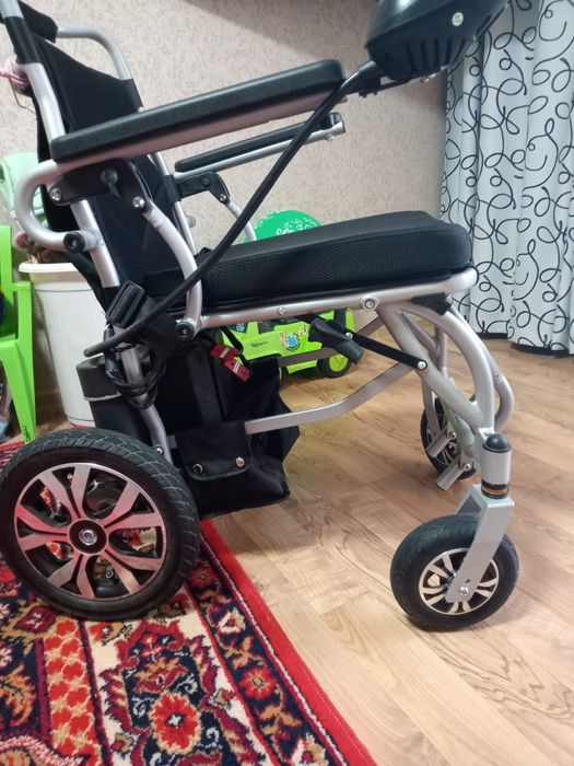 Инвалидная коляска с электроариводом