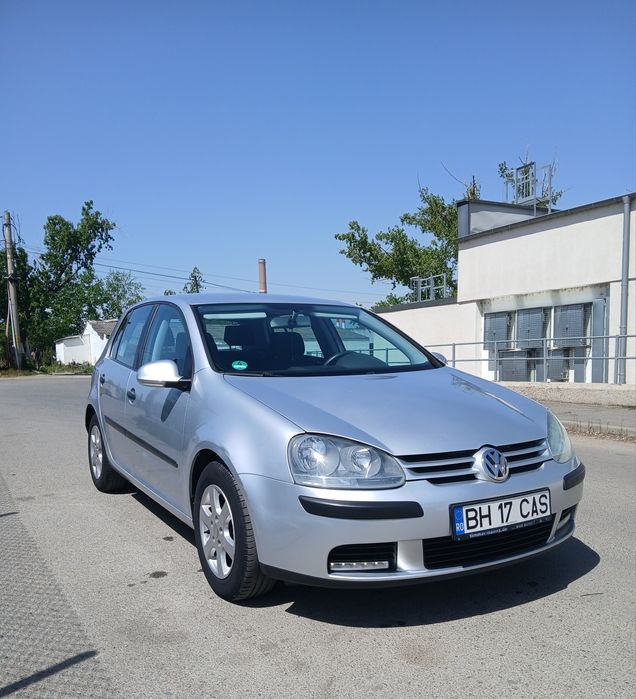 VW Golf 5  1,4 MPI benzina Climatronic .