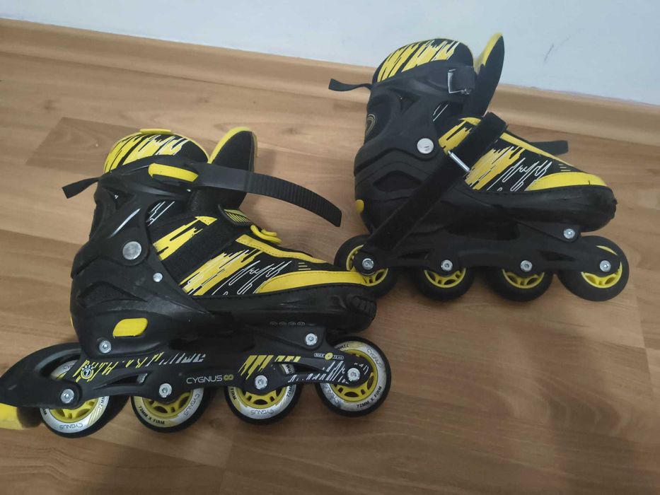 Patine cu rotile CYGNUS