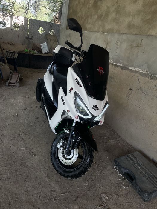 Макси.           .