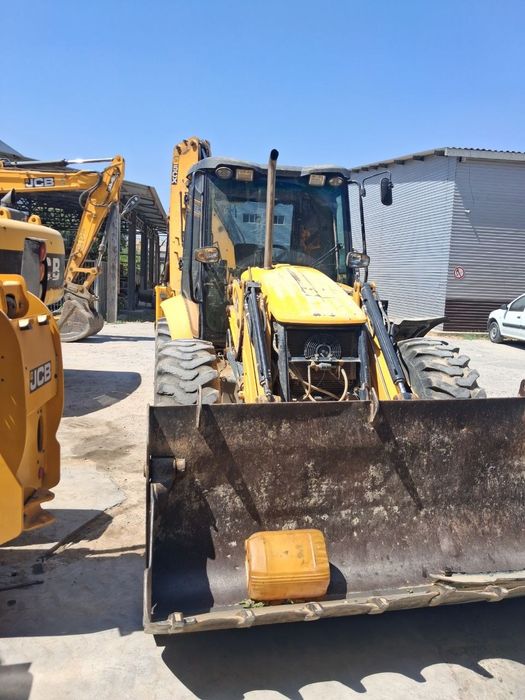 JCB 5cx Sotiladi holati yaxshi yili 2014