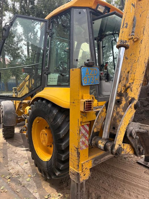 Экскаватор погрузчик 3в1