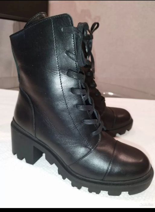 Новые кожаные ботинки
