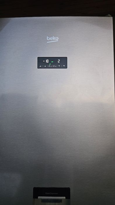 Combina beko cu dozator 1000lei