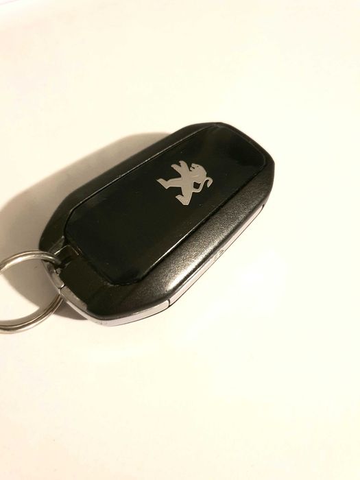 Оригинален ключ за Peugeot