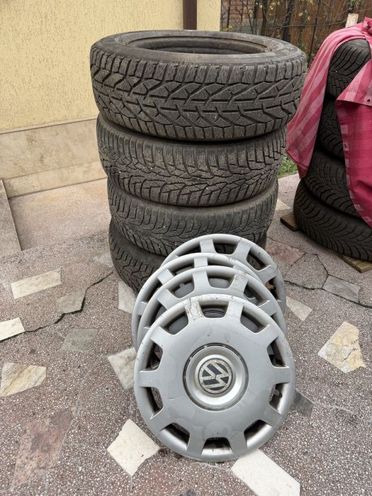 Vând set 4 cauciucuri de iarnă Volkswagen + 4 capace VW