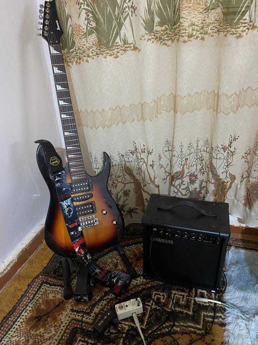 Электрогитара + комбоусилитель + педаль + аксессуары. Полный комплект!