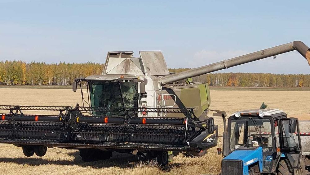 комбайн Claas Lexion 670 .