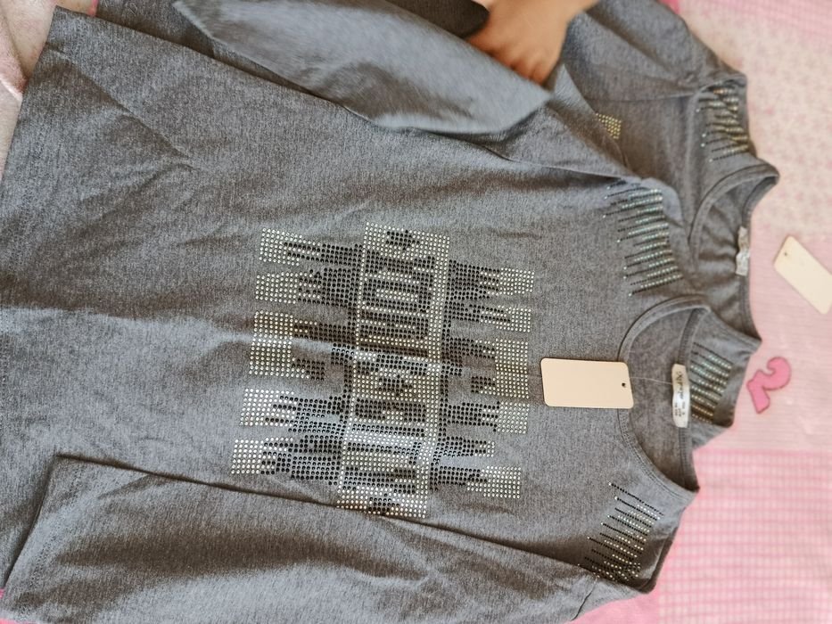 Новая одежда 700 тенге