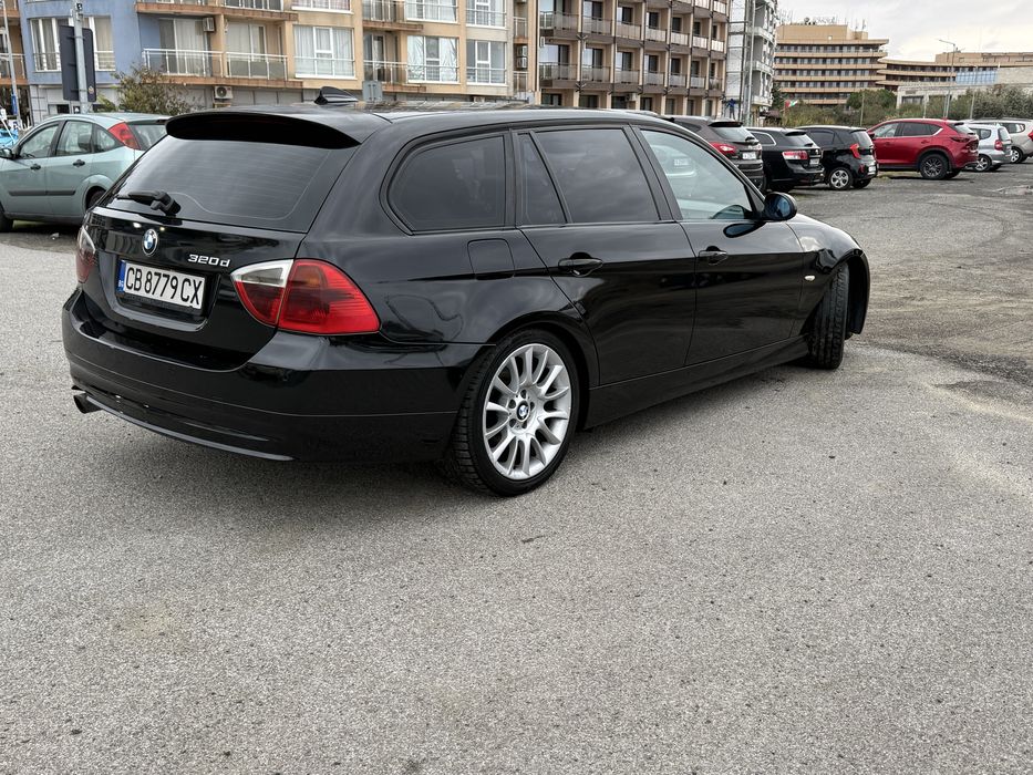 Bmw 320d 2008г .
