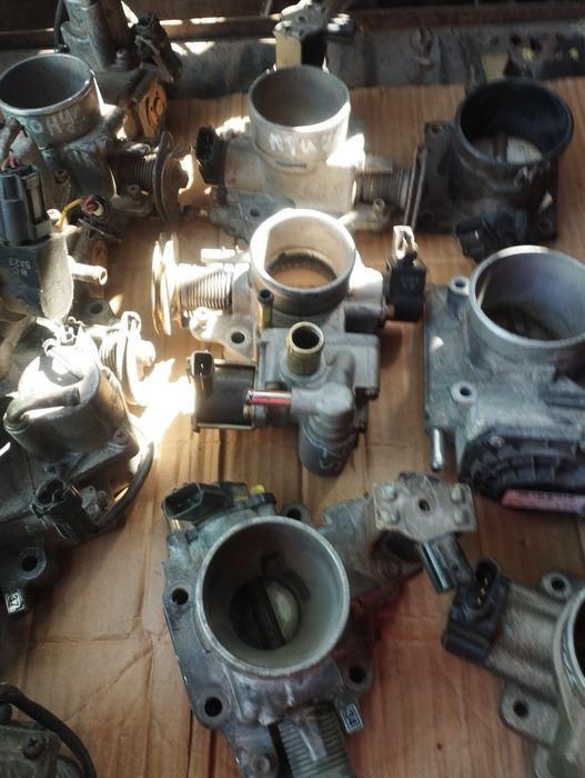 Дроссель на Мазду