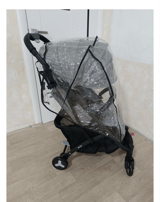 Дождевик и подставка для ног на коляску