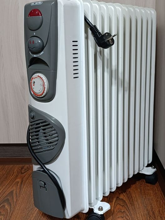 Обогреватель масляный. 11 секций, имеется вентилятор,.