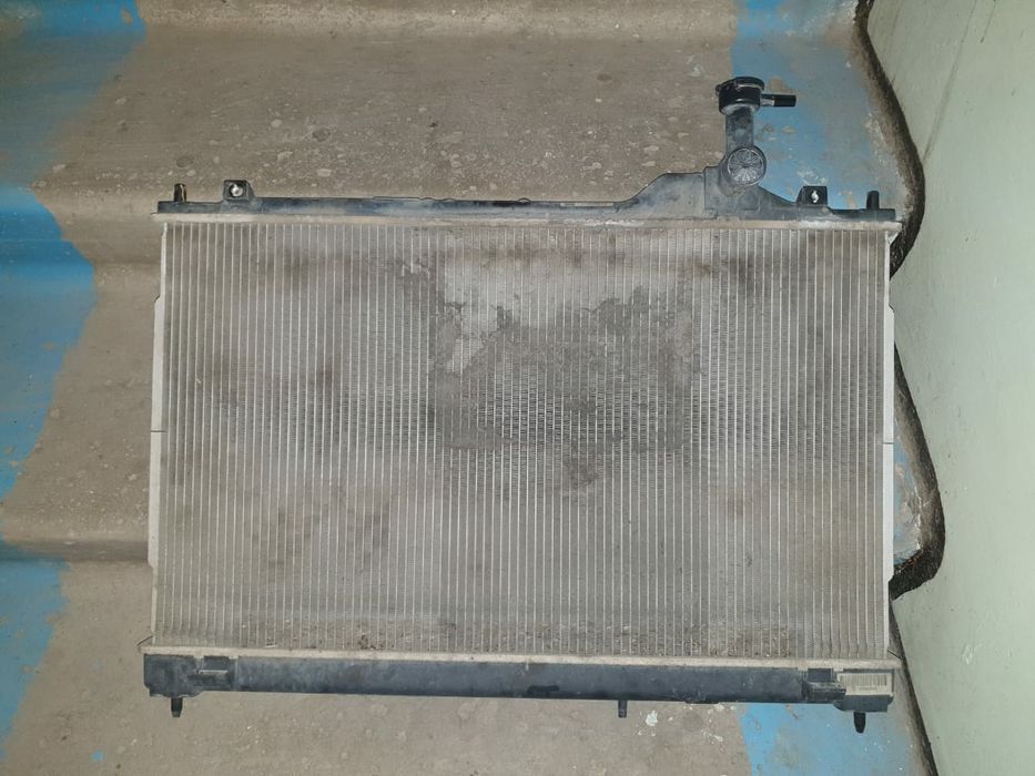 Продам радиатор на мидсубиси аутлендер
