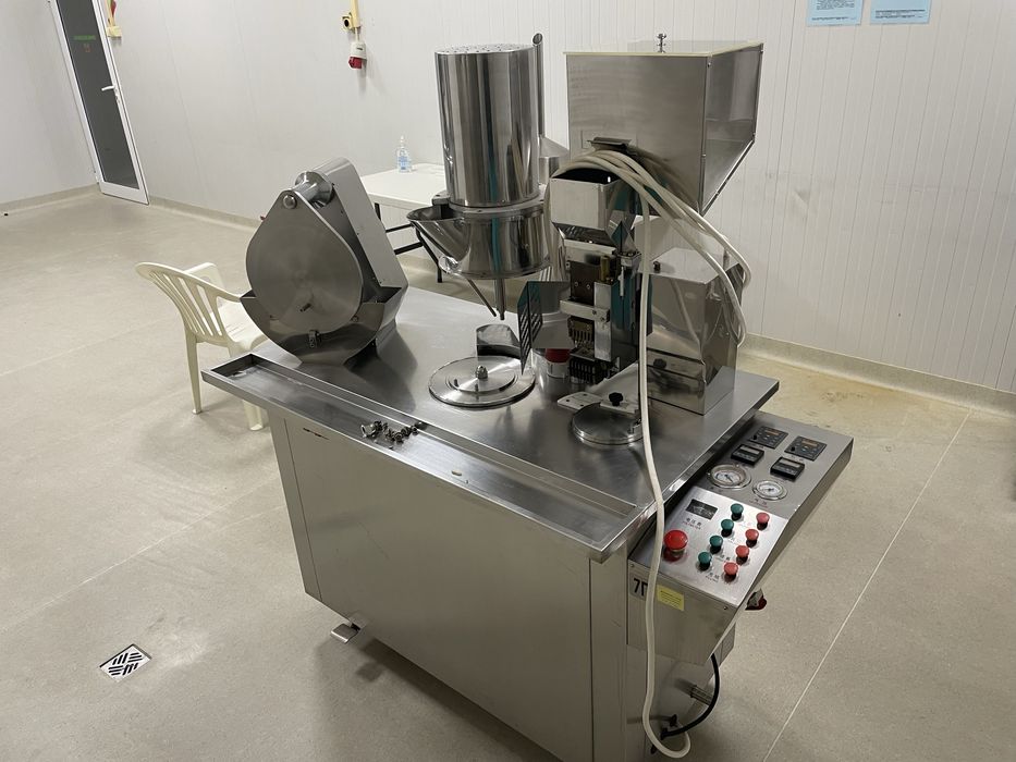 Капсулираща машина