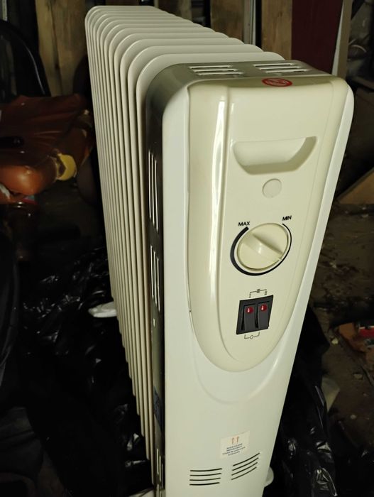 Vând calorifer electric cu ulei
