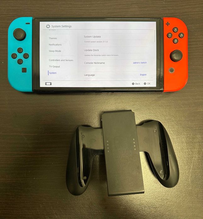 Nintendo Switch OLED HEG-001 + Joy-Con originale + Grip