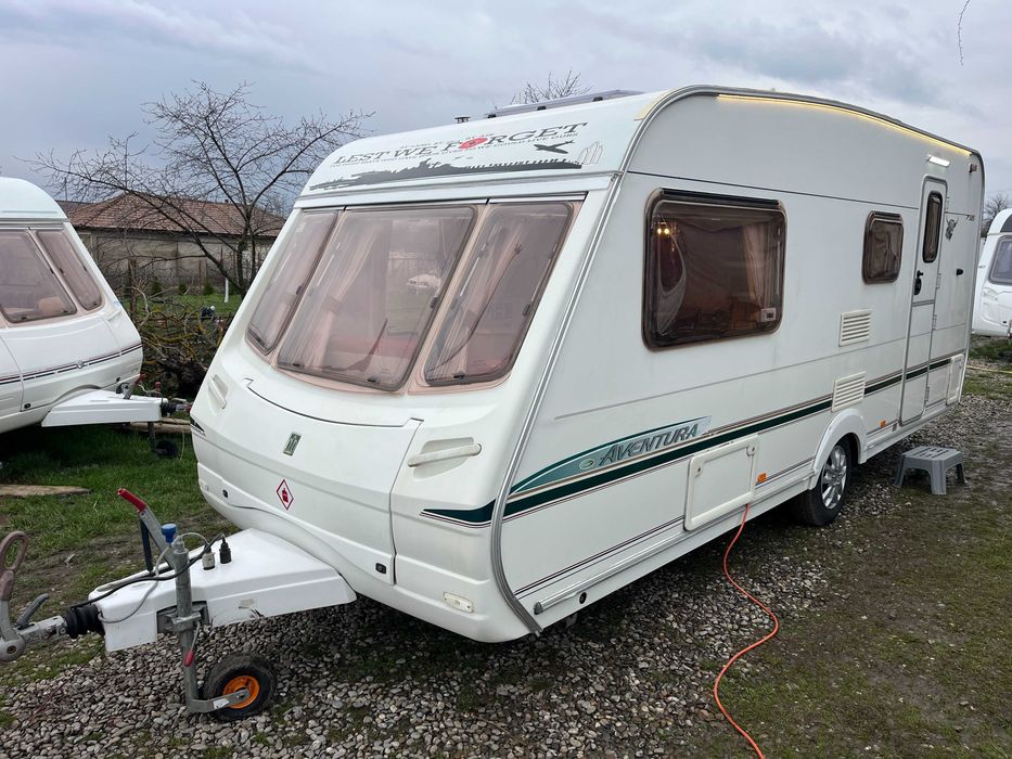 Rulota Swift Abbey Aventura 2004 Neinmatriculata 2 zone Baie mare in spate Cabina dus Off Camping Acumulator Boiler gaz Panou solar Trapa electrica