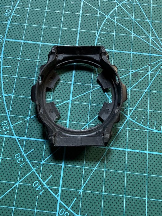 Bezel compatibil Casio MRG-1 – nou, inscriptie alb-argintiu