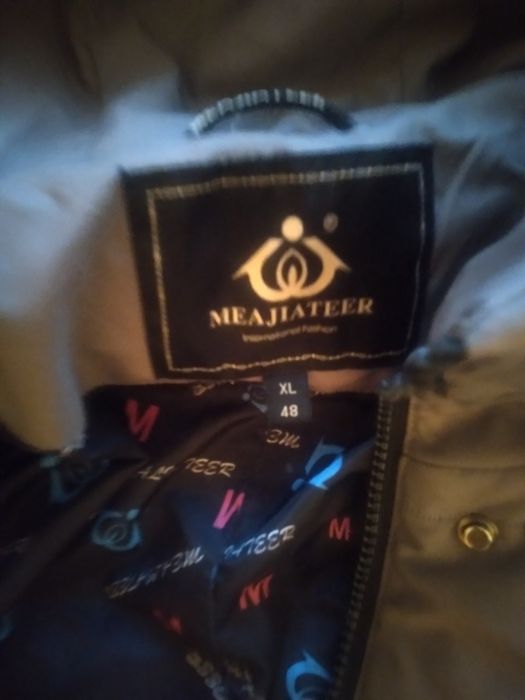 Продам женский пуховик