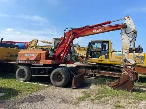Dezmembrez excavator pe roti OK MH PLUS - piese de schimb OK